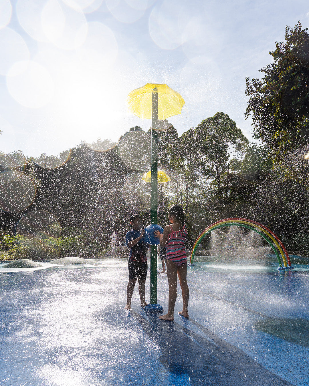 Vortex International's umbrella-shaped water feature at Jacob Ballas Children's Garden, creating a gentle water effect.