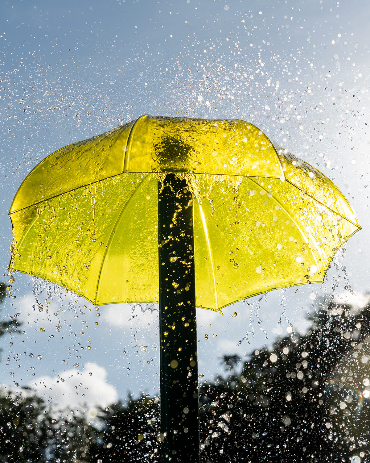 Vortex International's umbrella-shaped water feature at Jacob Ballas Children's Garden, creating a gentle water effect.