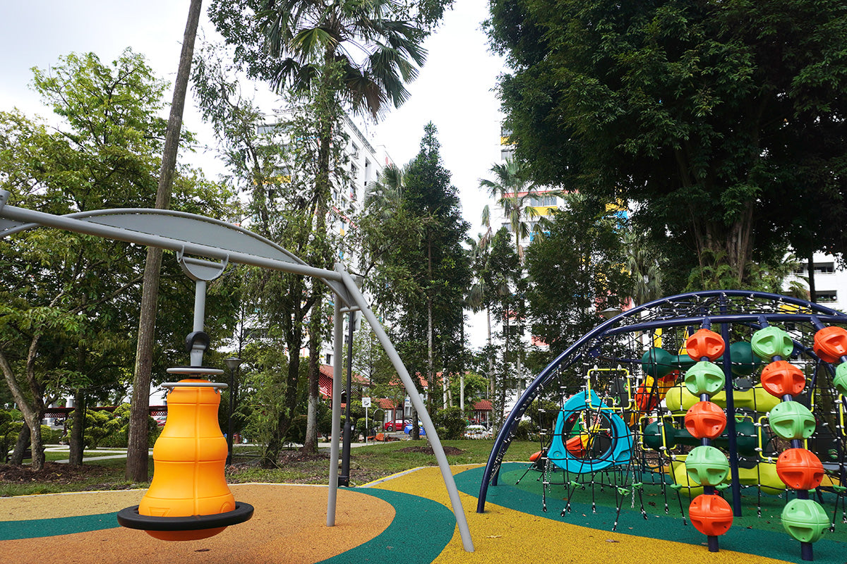 Teck Whye Garden playground features a dome-shaped climbing structure and a bell swing for safe, fun, and dynamic play.