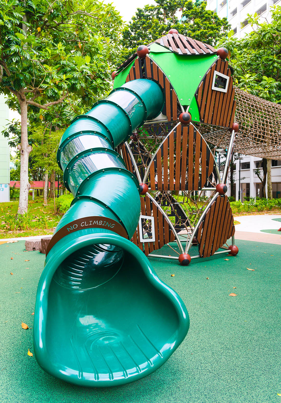 Berliner playground's thrilling tunnel slide offers a smooth descent, adding excitement and reward to every climb.