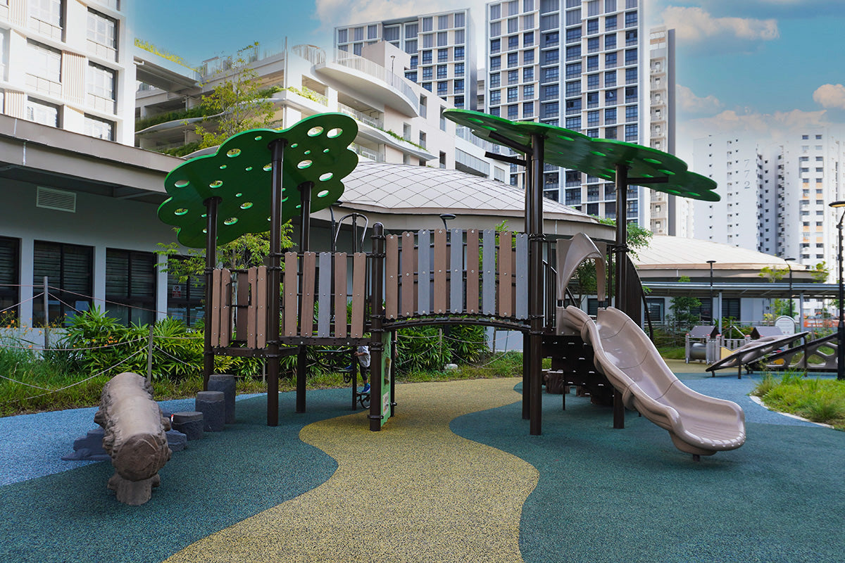 Tampines GreenOpal playground features slides, sensory play panels and a log balance beam for active outdoor play.