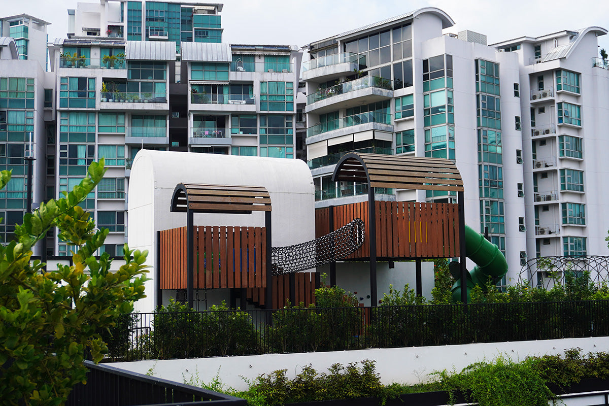 Jervois Mansion playground features elevated play towers linked by a rope tunnel, slide and shaded play decks.