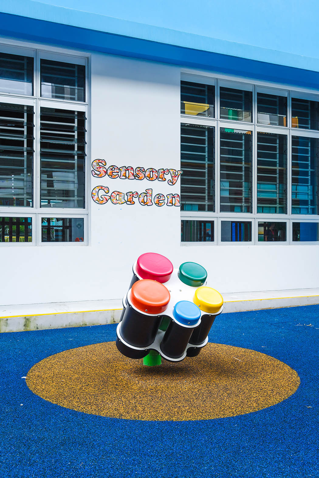 Playworld Concerto Congas create varied tones based on striking strength, encouraging creative musical exploration.