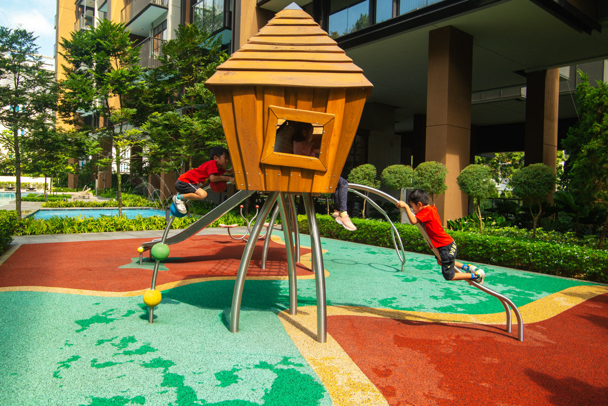 Stilum play combination with climbing balls, wobble bridge, playhouses, and slide for active, imaginative fun.