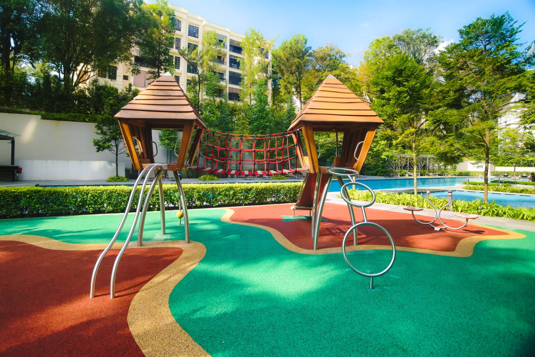 Stilum play combination with climbing balls, wobble bridge, playhouses, and slide for active, imaginative fun.