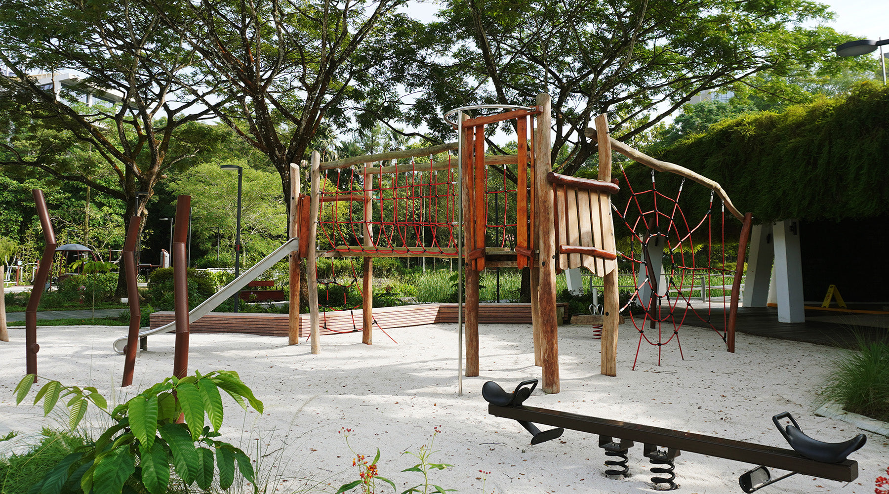 Jurong Eco-Garden playground with Robina wood and rope structures, providing safe and engaging play for children.