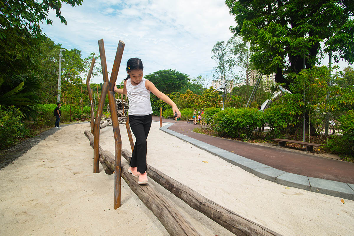Jurong Lake Garden Forest Rumble’s wooden balancing beam enhances balance and coordination for children.