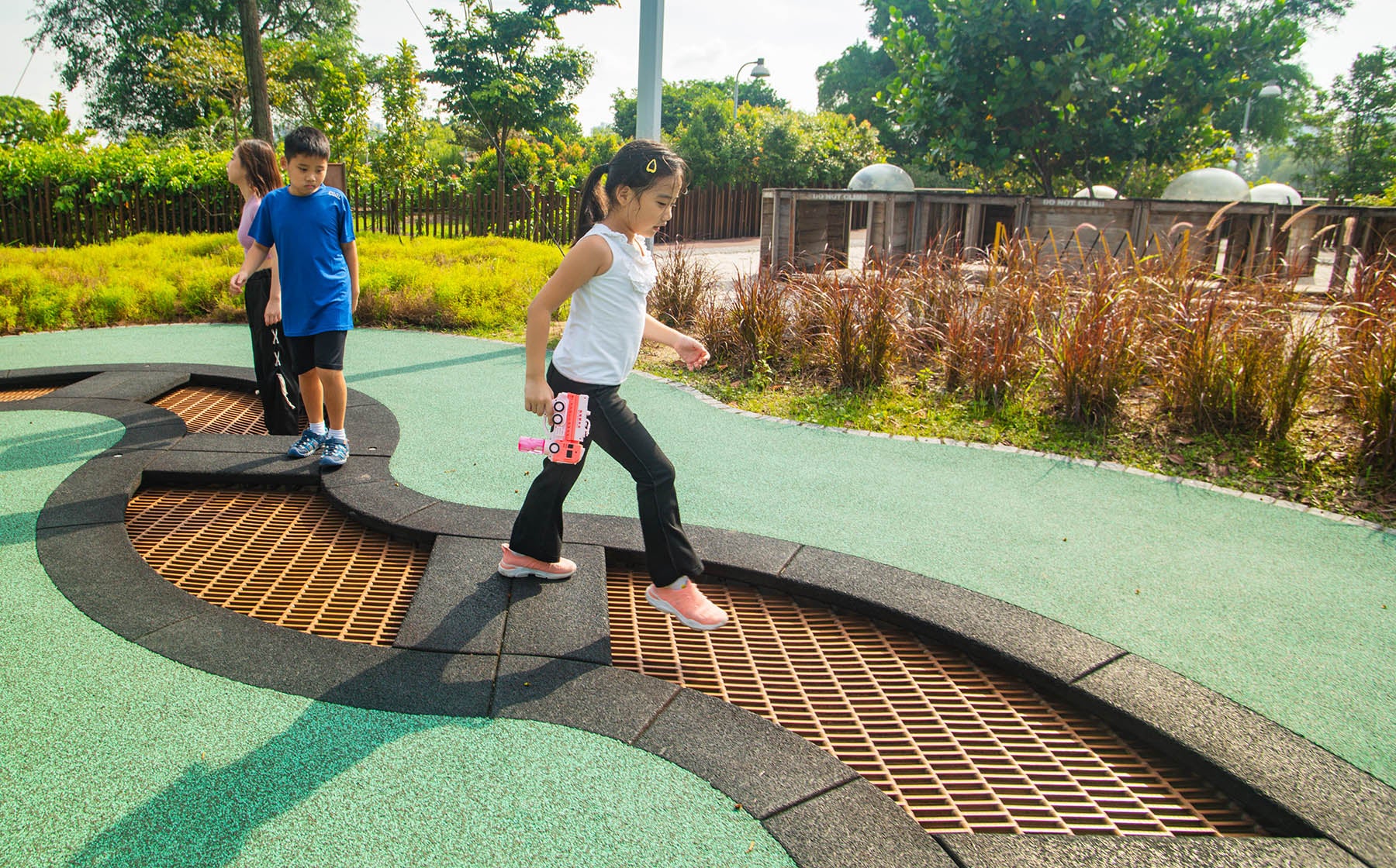 Jurong Lake Garden Forest Ramble's Frog Play trampolines offer energetic leaps, reflecting the playful nature of frogs.
