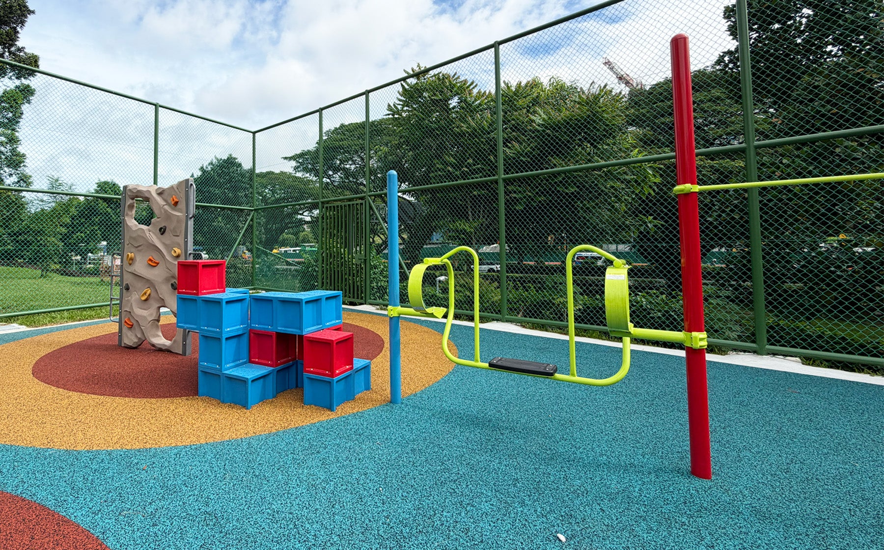 Jurong Primary School playground features climbing structures that help students safely build strength and coordination.