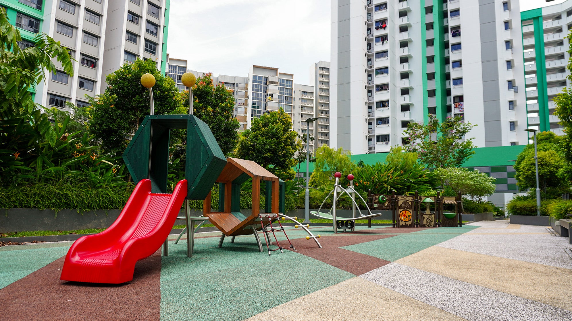 Stilum playground equipment designed to enhance children's motor skills and curiosity through engaging play.