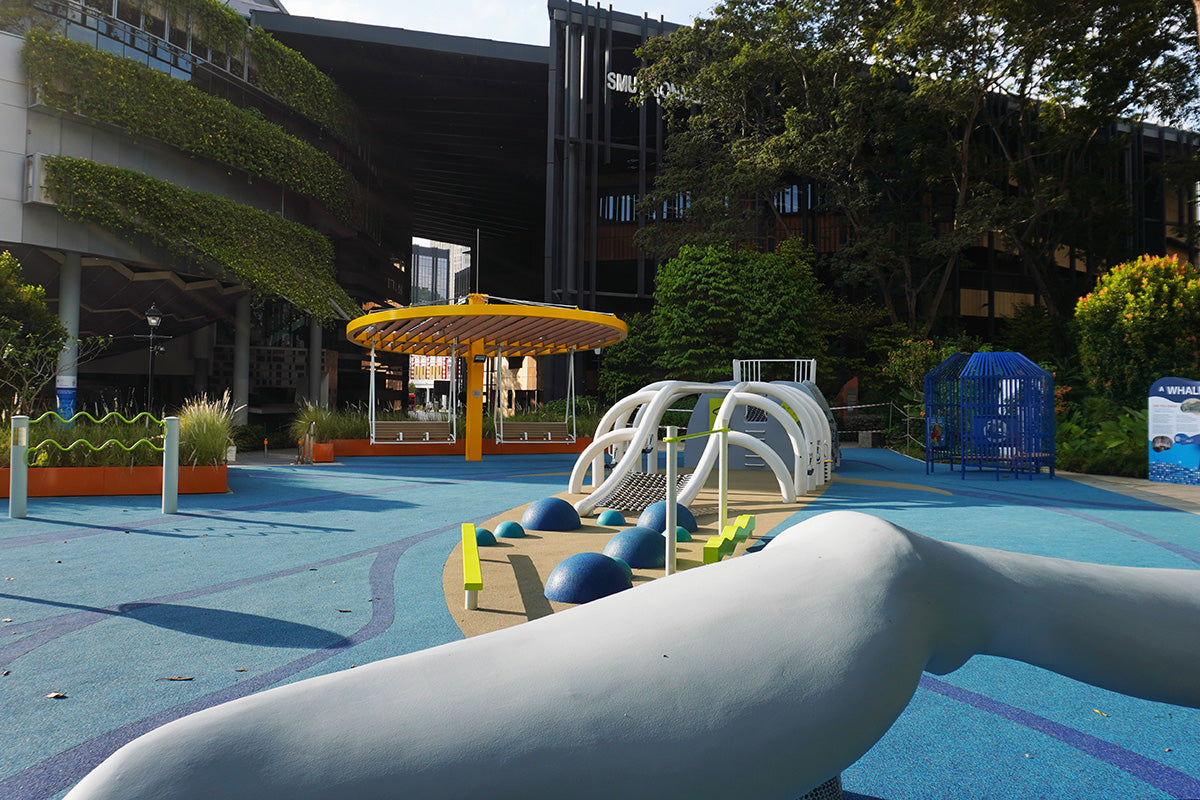 A Whale of a Tale playground at the National Museum of Singapore features a blue whale-shaped customised play structure.