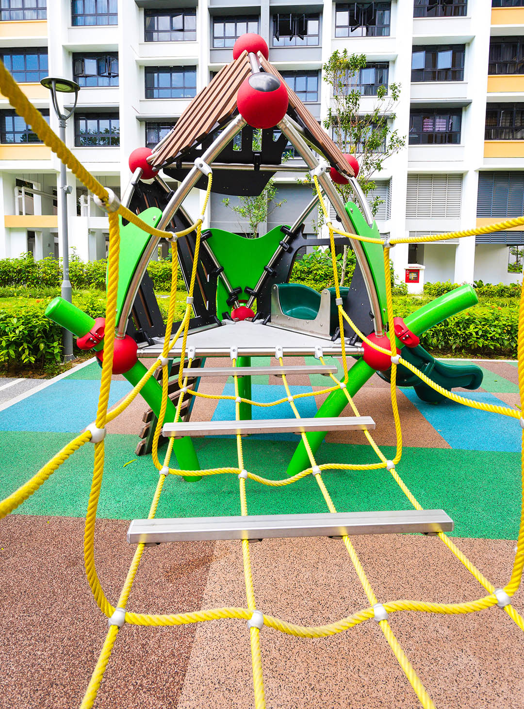 Berliner playground with a rope bridge, offers children a fun and challenging way to enhance balance and explore.