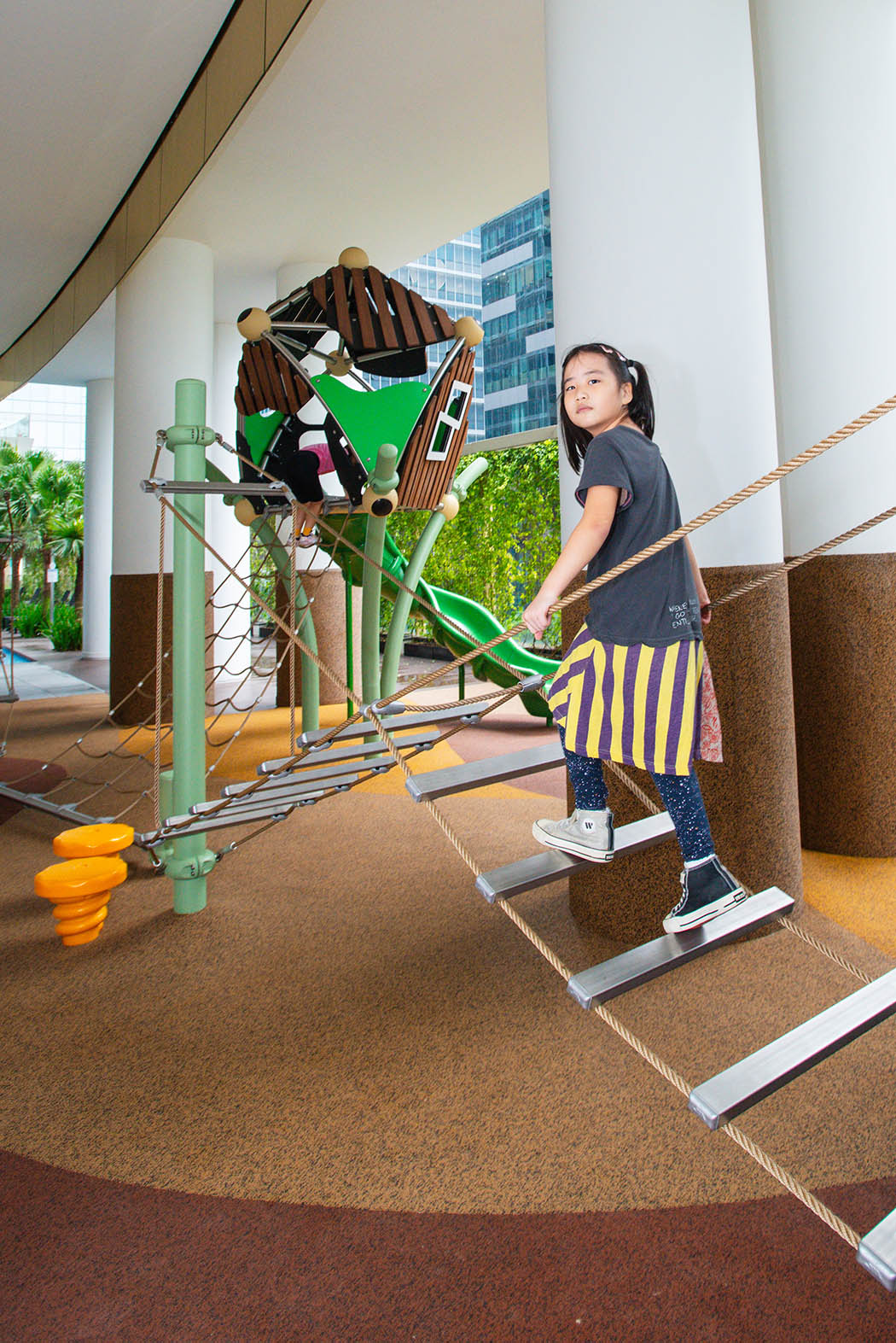One Shenton playground featuring Berliner equipment with rope play, hopping, and a Greenville play set for active fun.