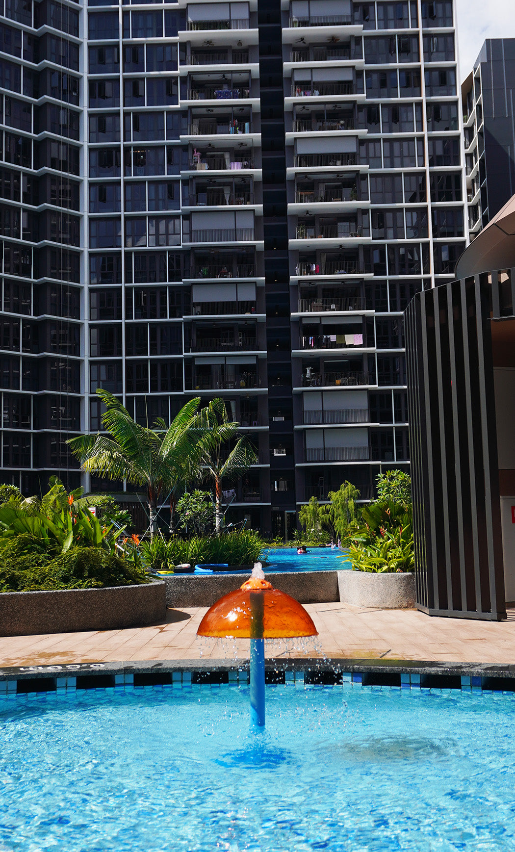Parc Central Residence features a umbrella-shaped Vortex International equipment that cascades water for playful fun.
