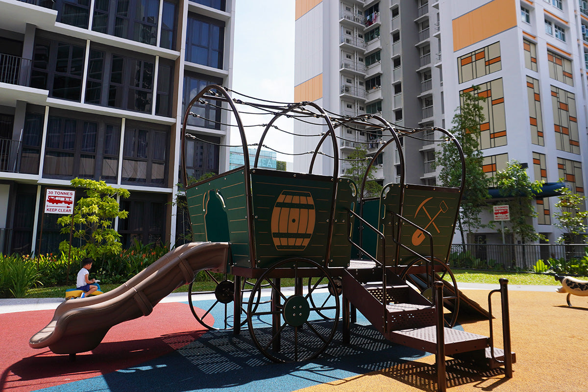 Parc Central Residence features a Playworld Horse & Carriage playground, offering whimsical fun with elegant design.