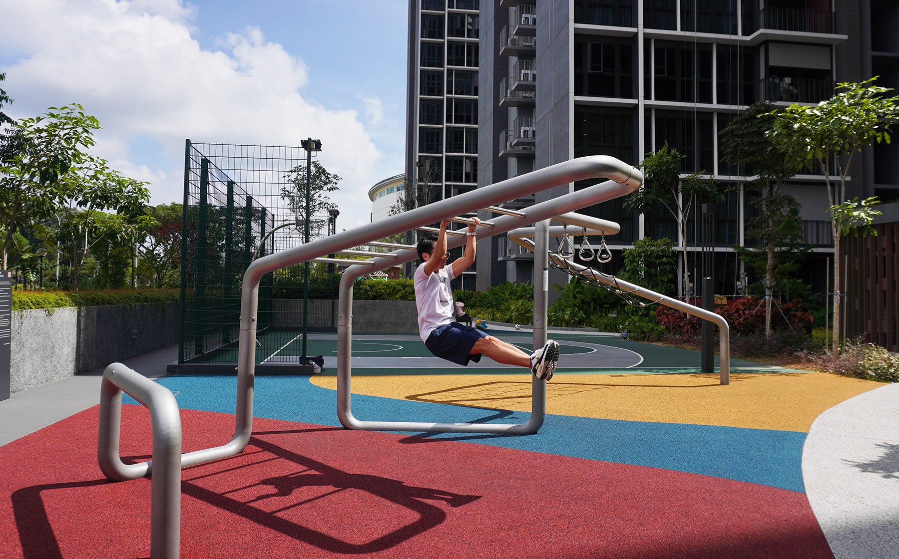 Parc Central Residence Berliner Calisthenics Fitness Station offering bodyweight exercises for strength and flexibility.