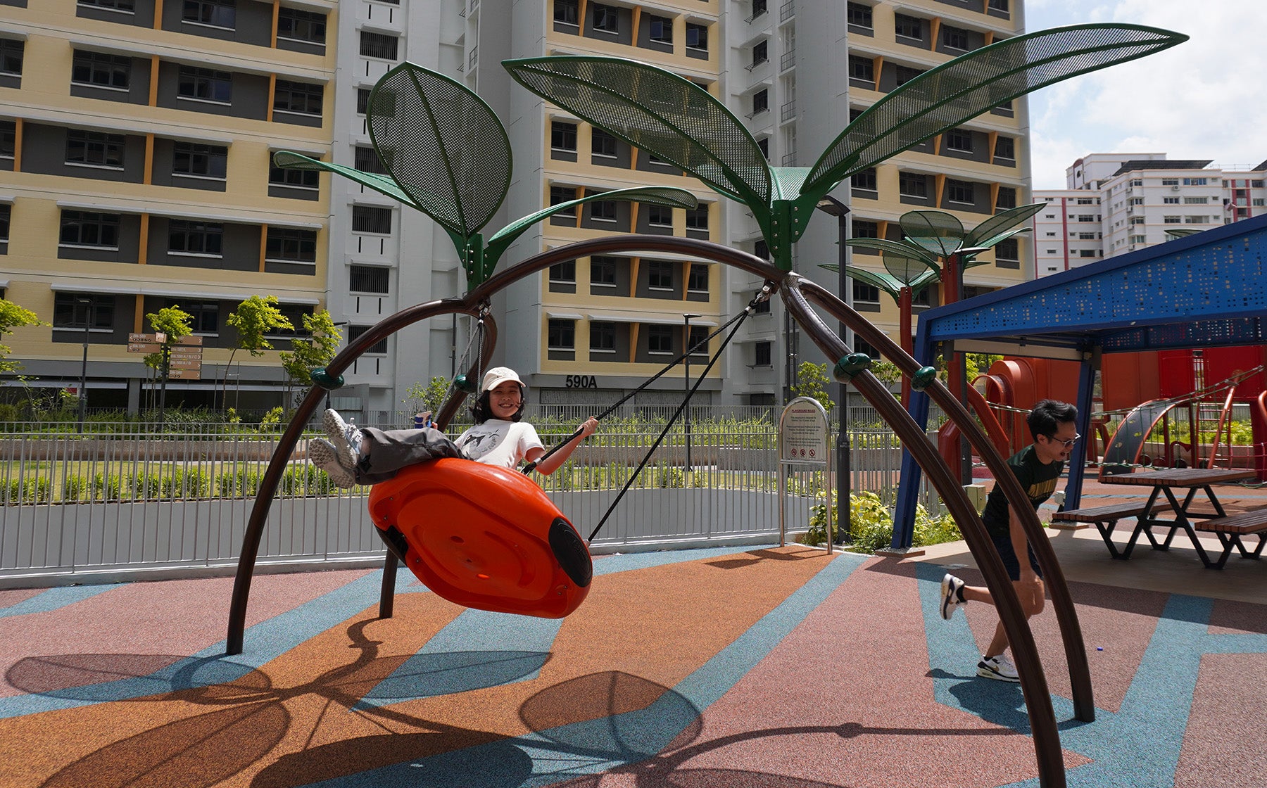 Circular swing lets multiple children play together, encouraging social interaction and cooperative fun.