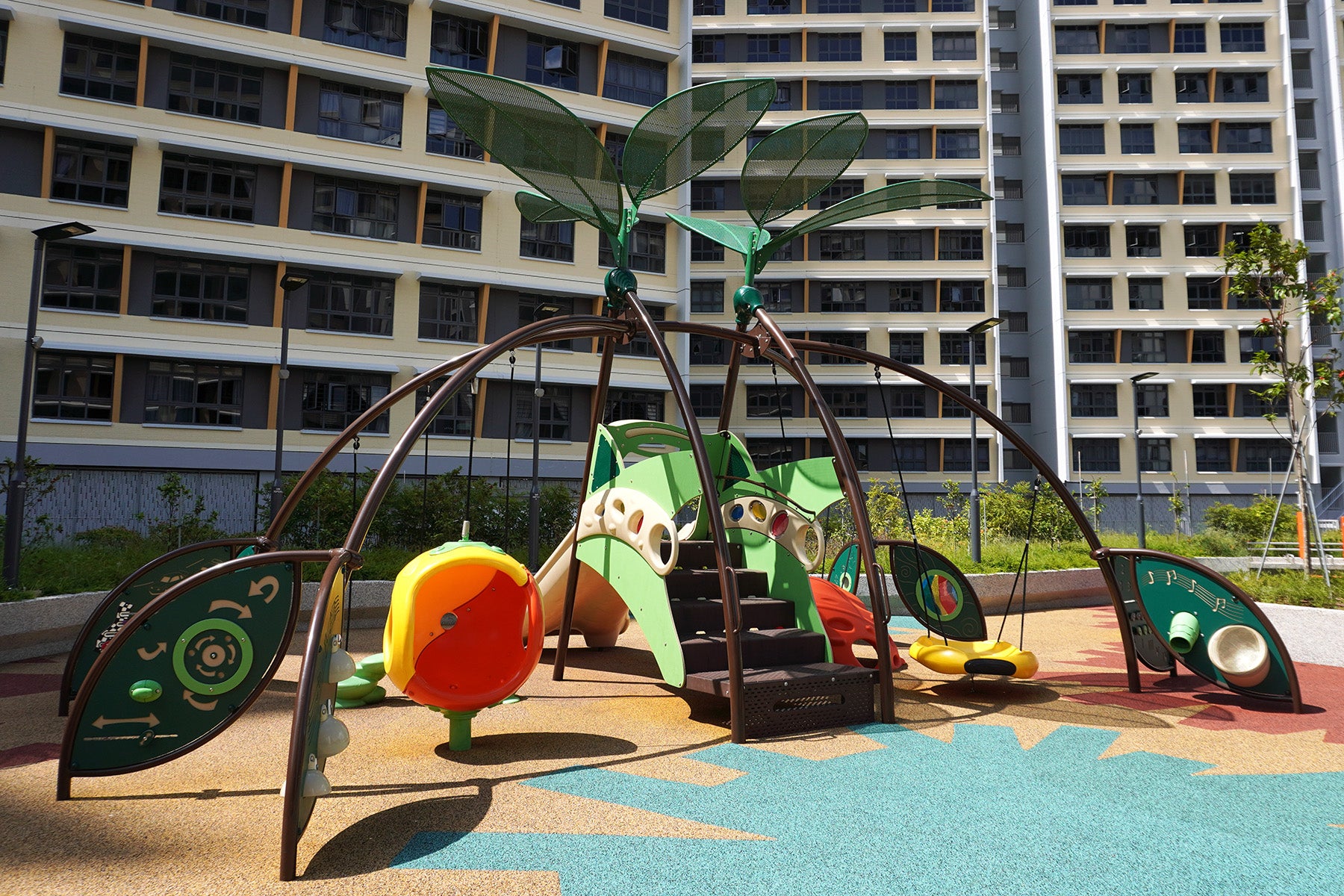 Playworld Bambino multi-sensory play structure with activity panels supporting balance, coordination and play.