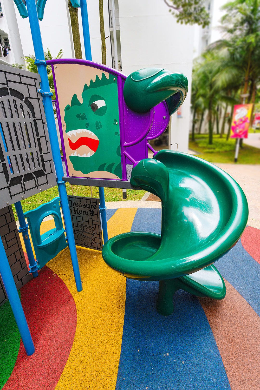Dragon-themed playground with a spiral tail slide, providing a thrilling descent and a fun climbing experience for kids.