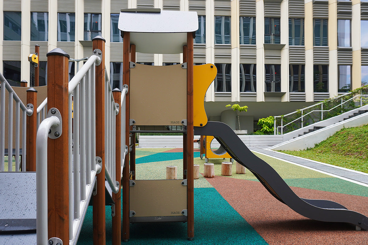 Punggol Digital District playground features a safe design with an undulating bridge and slide for fun, active play.
