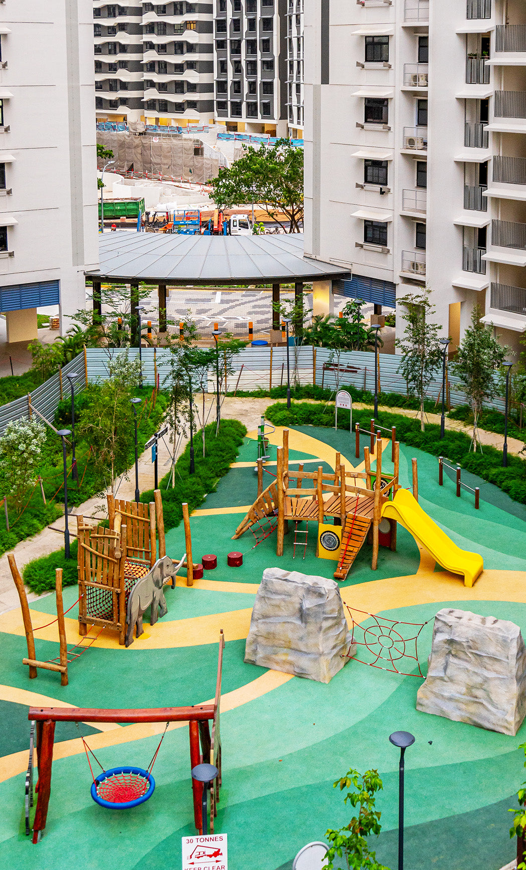 Punggol Point Crown animal-themed playground for 5-12 year olds with swings, rock climbing, slides, and rope play.