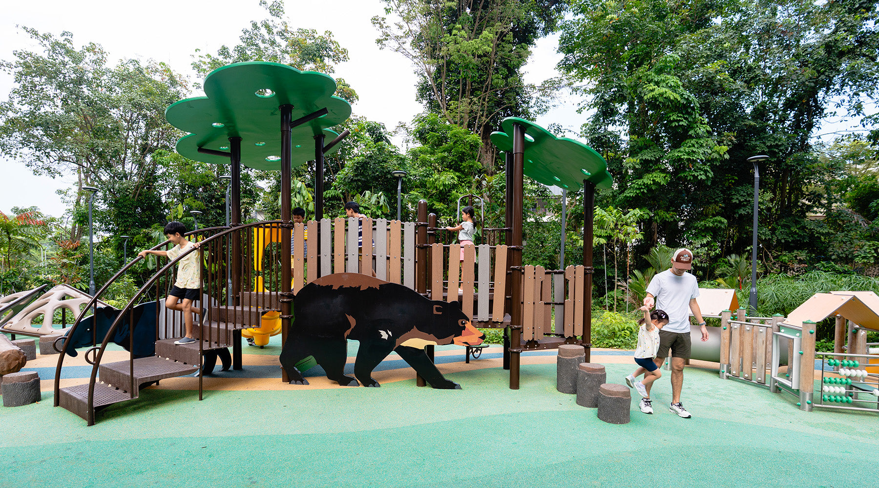 Punggol Point Crown animal-themed playground for 2-5 year olds features Playworld equipment and a panel with a Bear.