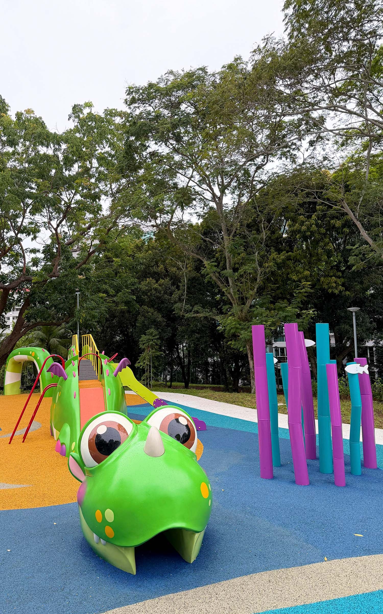 Sea Shell Park playground featuring Sea Dragon Playground with slides, climbers, and anemone-themed play poles.