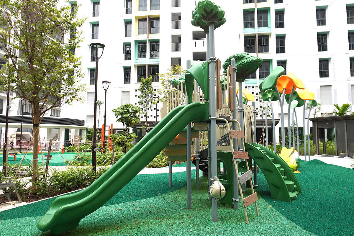 Tengah Parc Clover nature-inspired playground with bridges, ladders, slides and climbing components for active play.