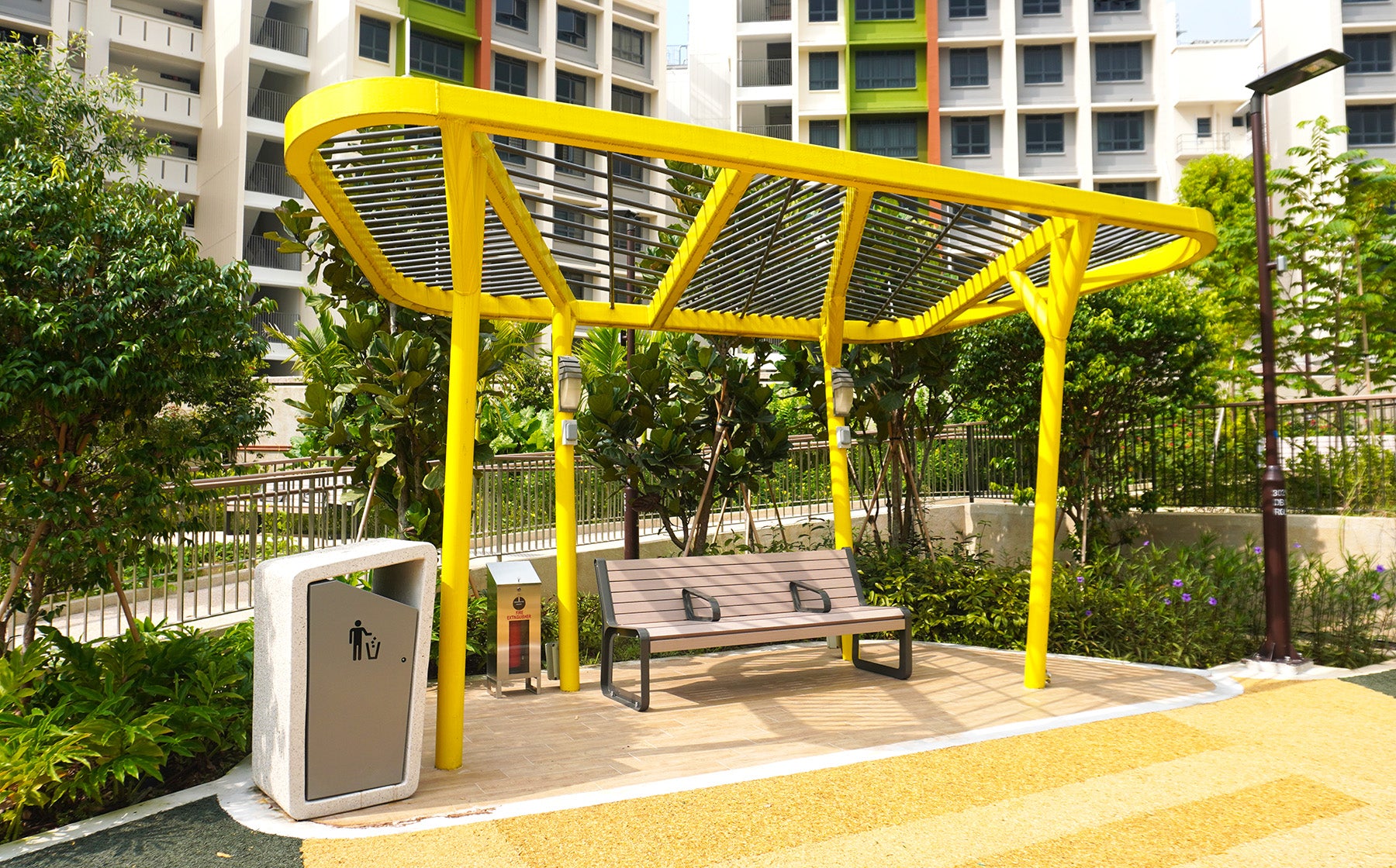 Parc Point playground features Outerspace benches that provide comfortable seating beside the vibrant play area.