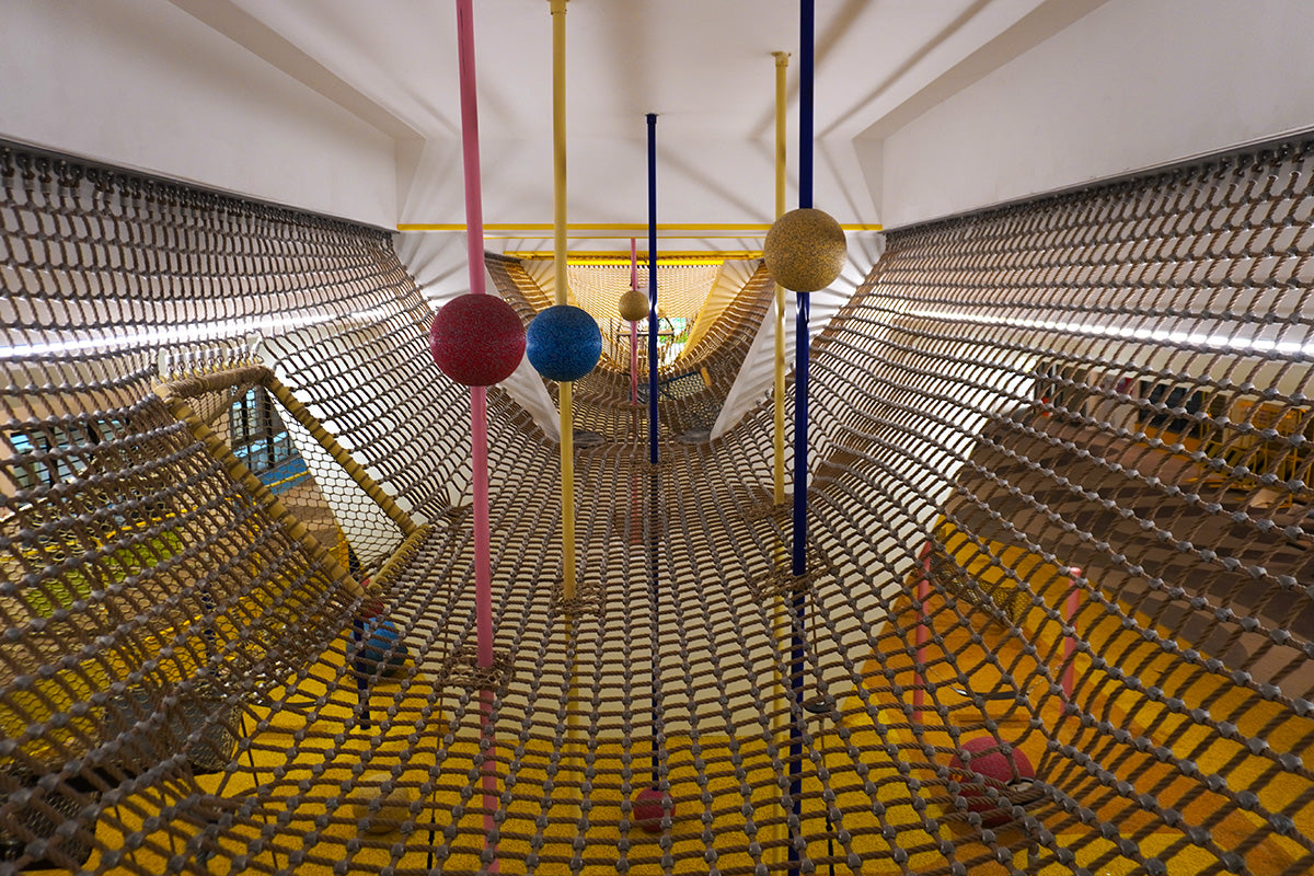 Parc Residences @ Tengah Social Hub features suspended play spheres that add balance challenges to the rope playground.