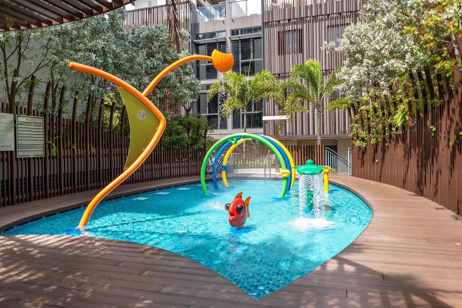 Vortex Internation playground fish-themed equipment spraying water and large fountains.
