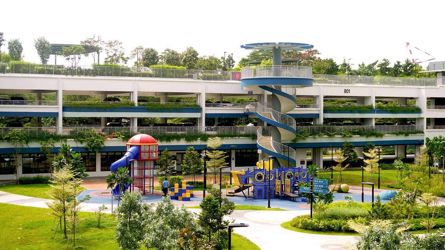 West Coast ParkView Playground with a Lighthouse Tower, pirate ship-themed playground, and sea creature mounds.