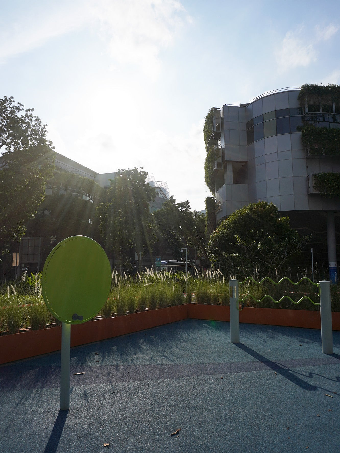 Interplay fitness equipment in the multi-generational playground helps seniors stay active and maintain fitness.