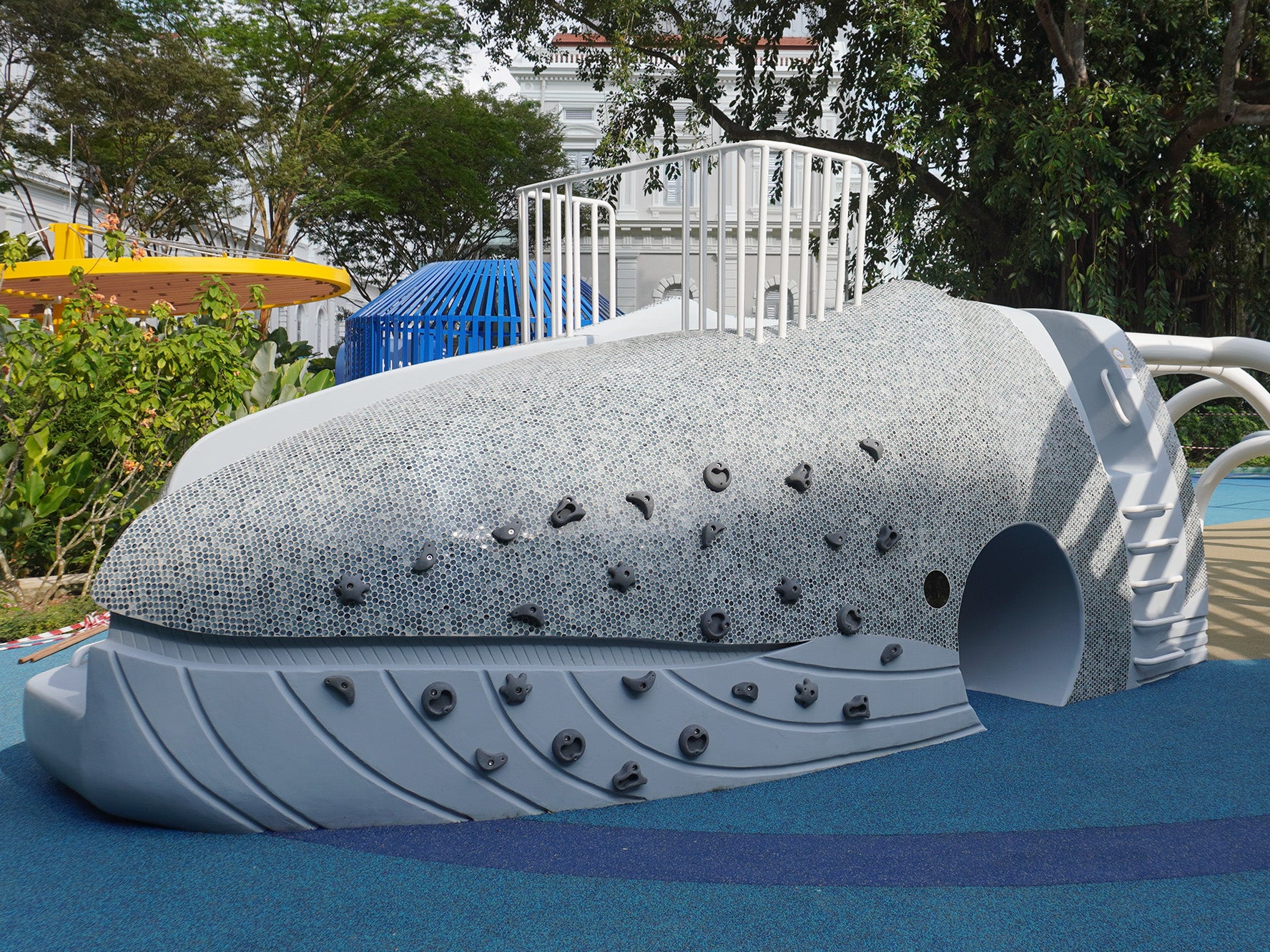 The head of the Whale of a Tale playground at the National Museum Singapore features safe barnacle-like climbing holds.