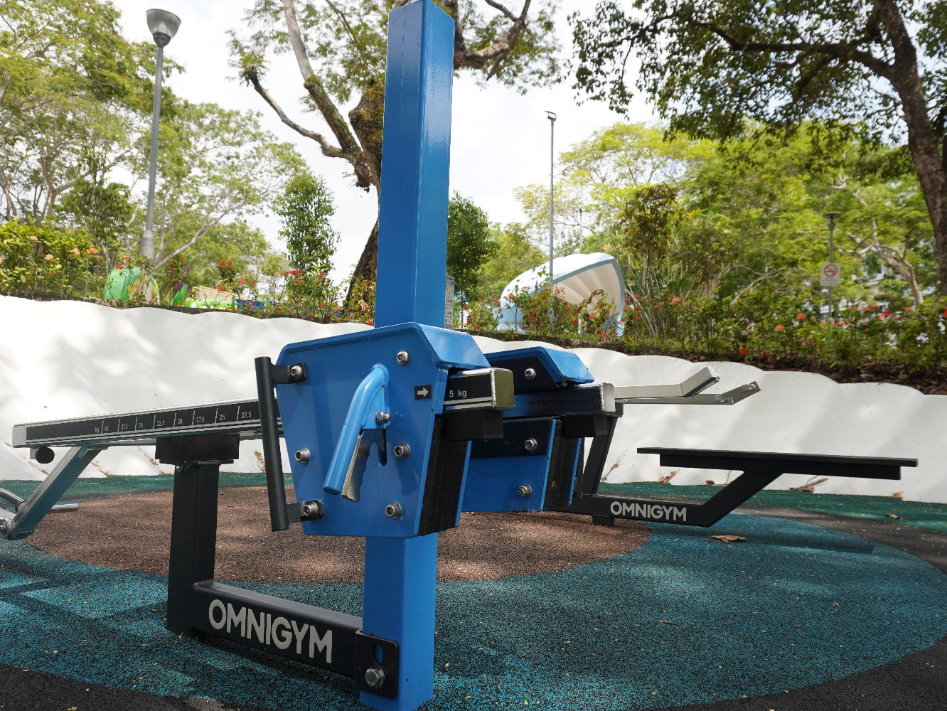 Omnigym fitness equipment comes with adjustable weights, offering versatile outdoor training for all strength levels.