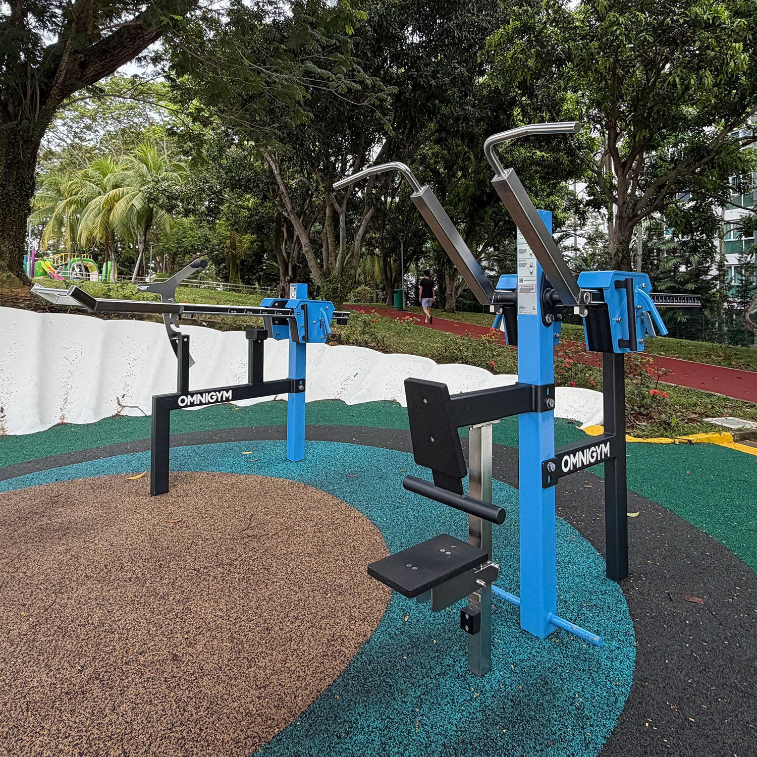 Sea Shell Park Omnigym fitness equipment offers adjustable weights for adults to build upper body strength safely.