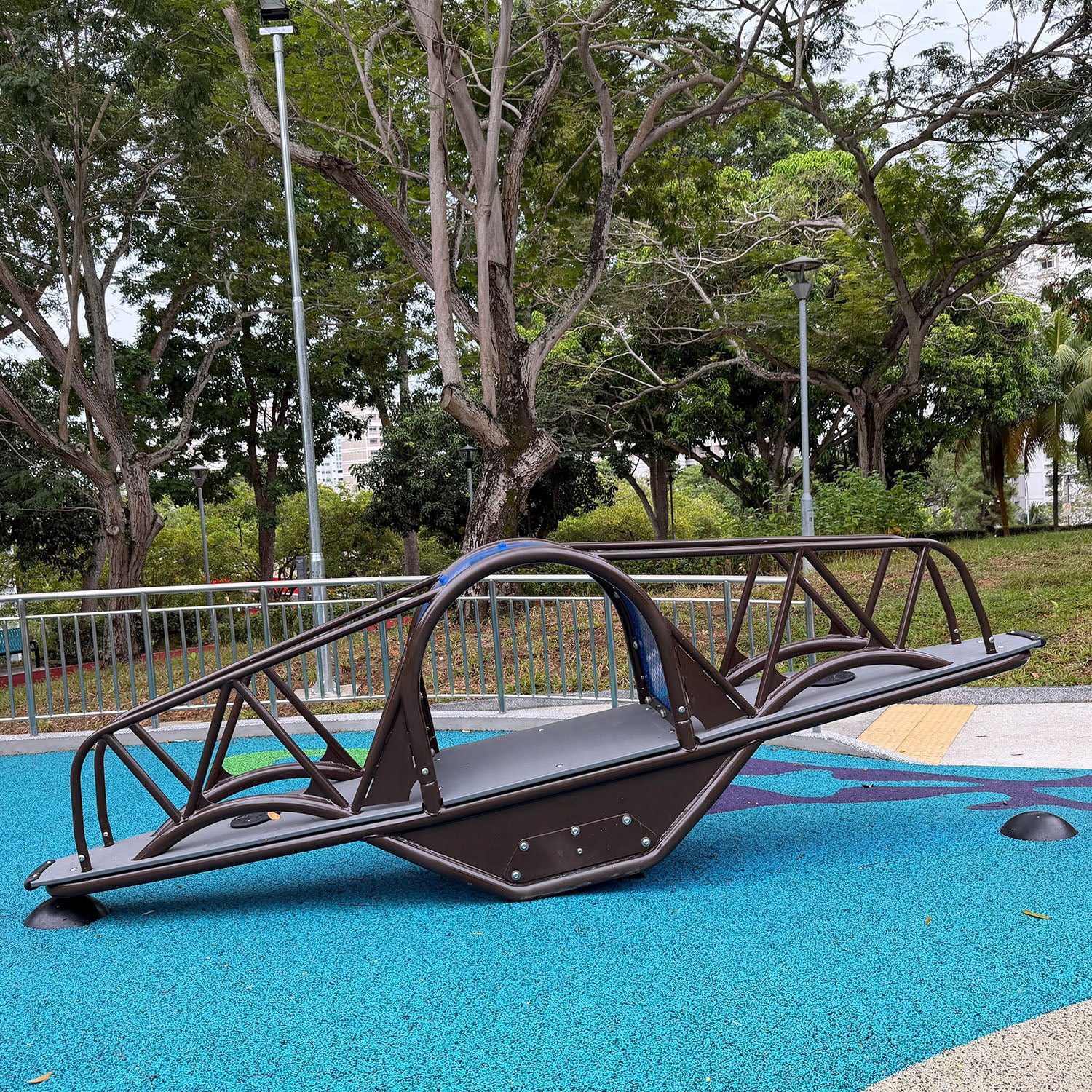 Sea Shell Park playground features a Standing Seesaw, providing a safe and exhilarating group play.