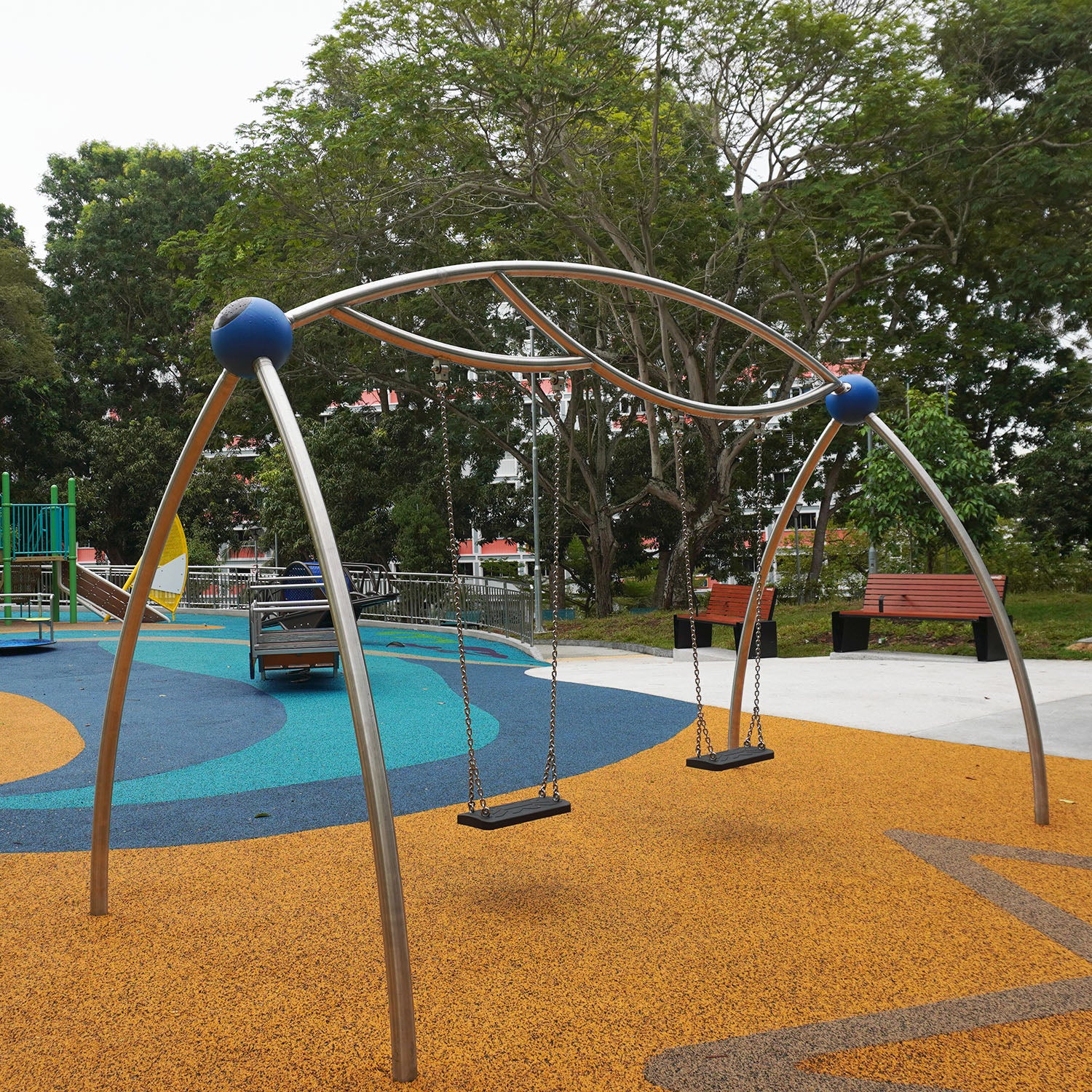 Sea Shell Park playground features a Berliner Swing with two seats, providing a safe, exciting, and fun children's play.