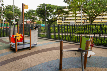 A playground with multiple play equipment designed for little children to enjoy , explore and create an environment for safe play