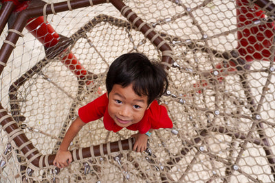 Custom-built Berliner and Polyfix rope playground structure designed for safe climbing and enhancing coordination.