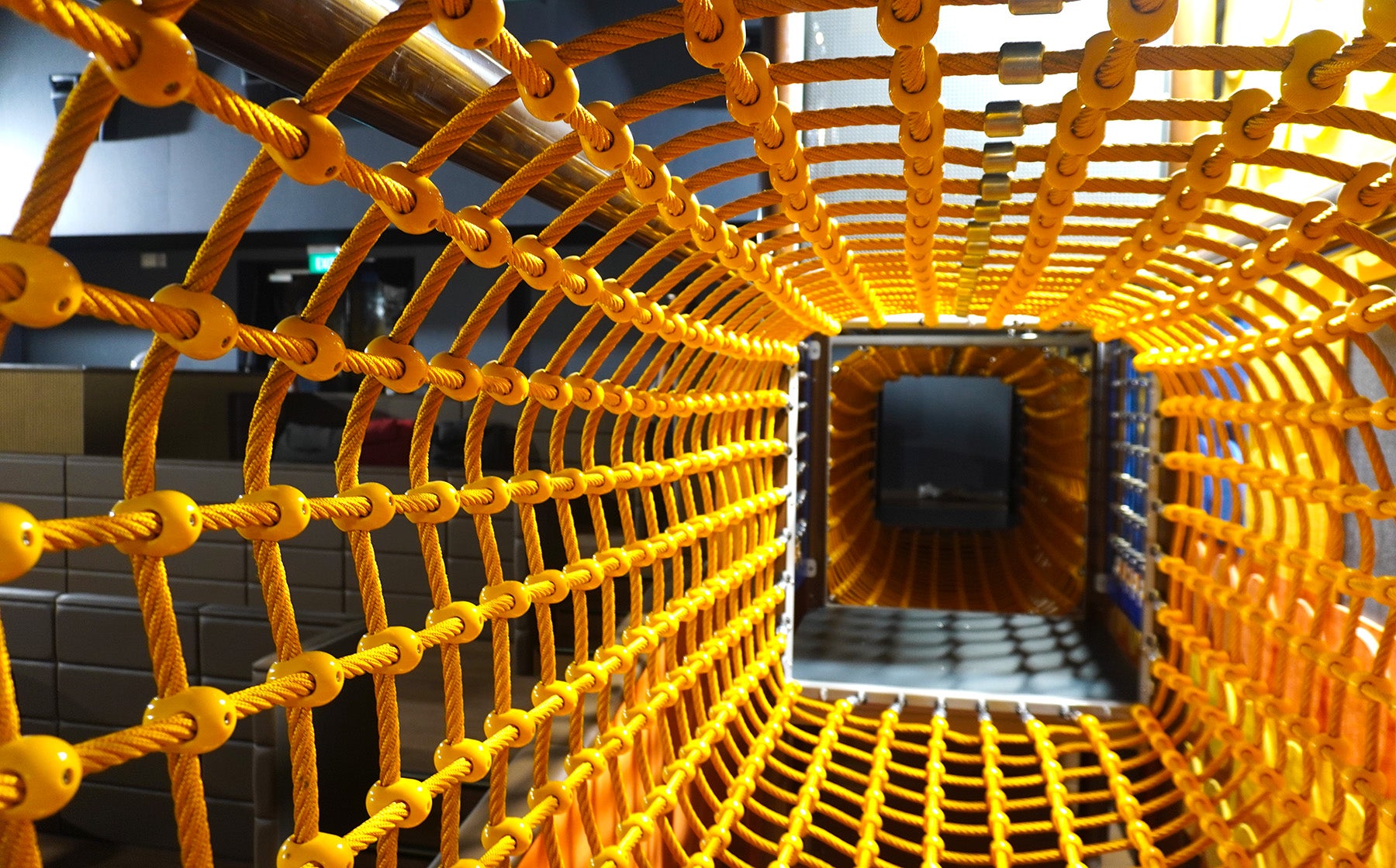 Dreamers at Shaw Theatre playground features elevated rope tunnels that encourage active crawling, climbing and play.
