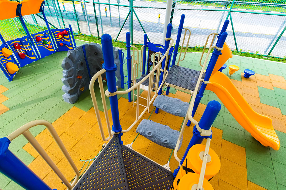 Shaded Playworld playground features a balancing bridge and play panels, encouraging creativity and balance skills.