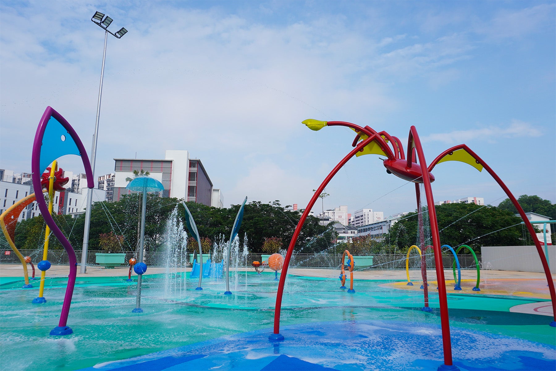Jurong East Swimming Complex playground offers high-energy water play with a strong focus on safety and fun.
