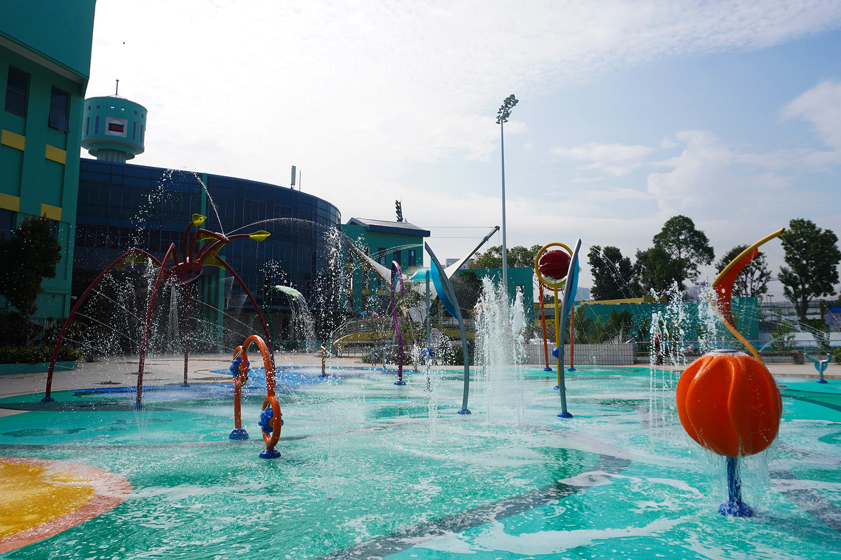 Jurong East Swimming Complex aquatic playground with a mega orb and Twirl Tec for a splashing interactive water play.
