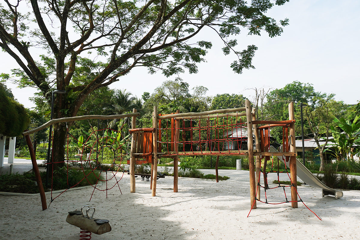 Jurong Eco-Garden playground featuring Berliner equipment with rope structures and a slide for safe active play.
