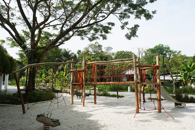 Jurong Eco-Garden playground featuring Berliner equipment with rope structures and a slide for safe active play.
