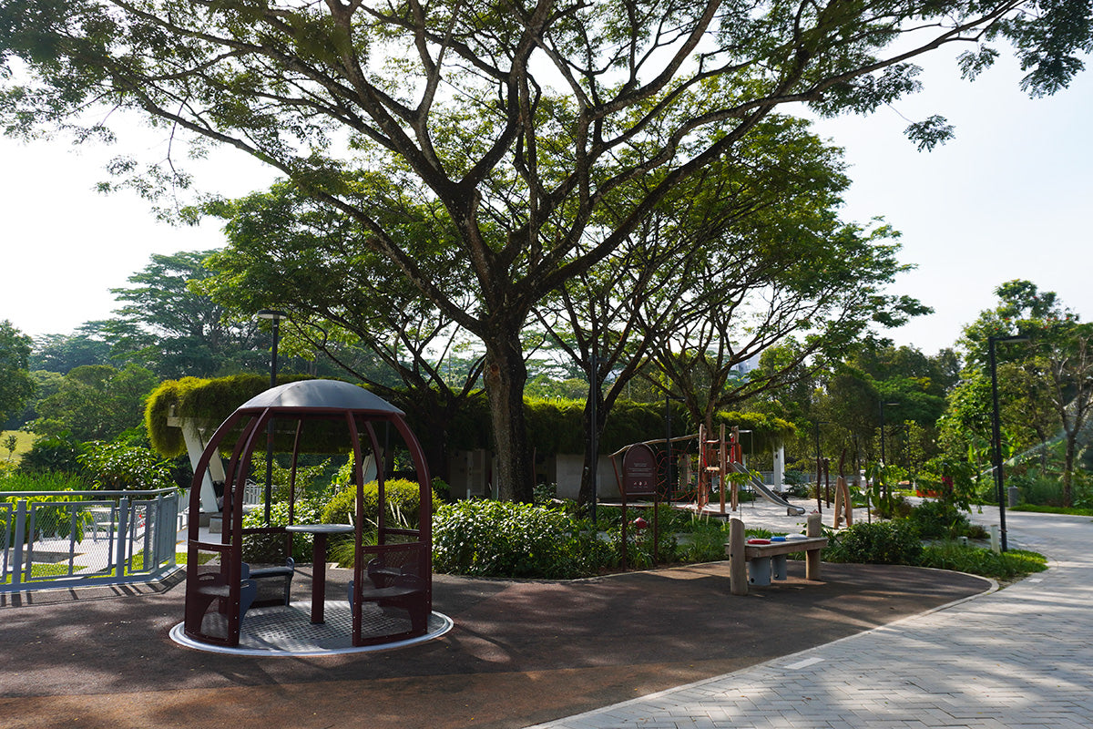Jurong Eco-Garden playground features a sheltered merry-go-round with seats for safe, endless fun for children.