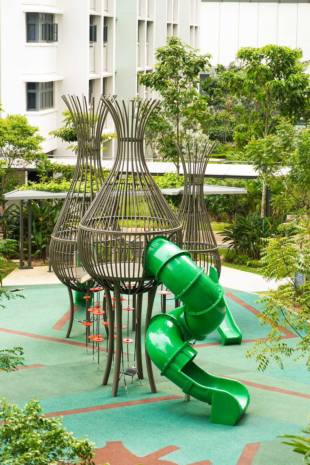 A playground with a bird nest structure design located at Keat Hong Verge with nature inspired playground equipment.