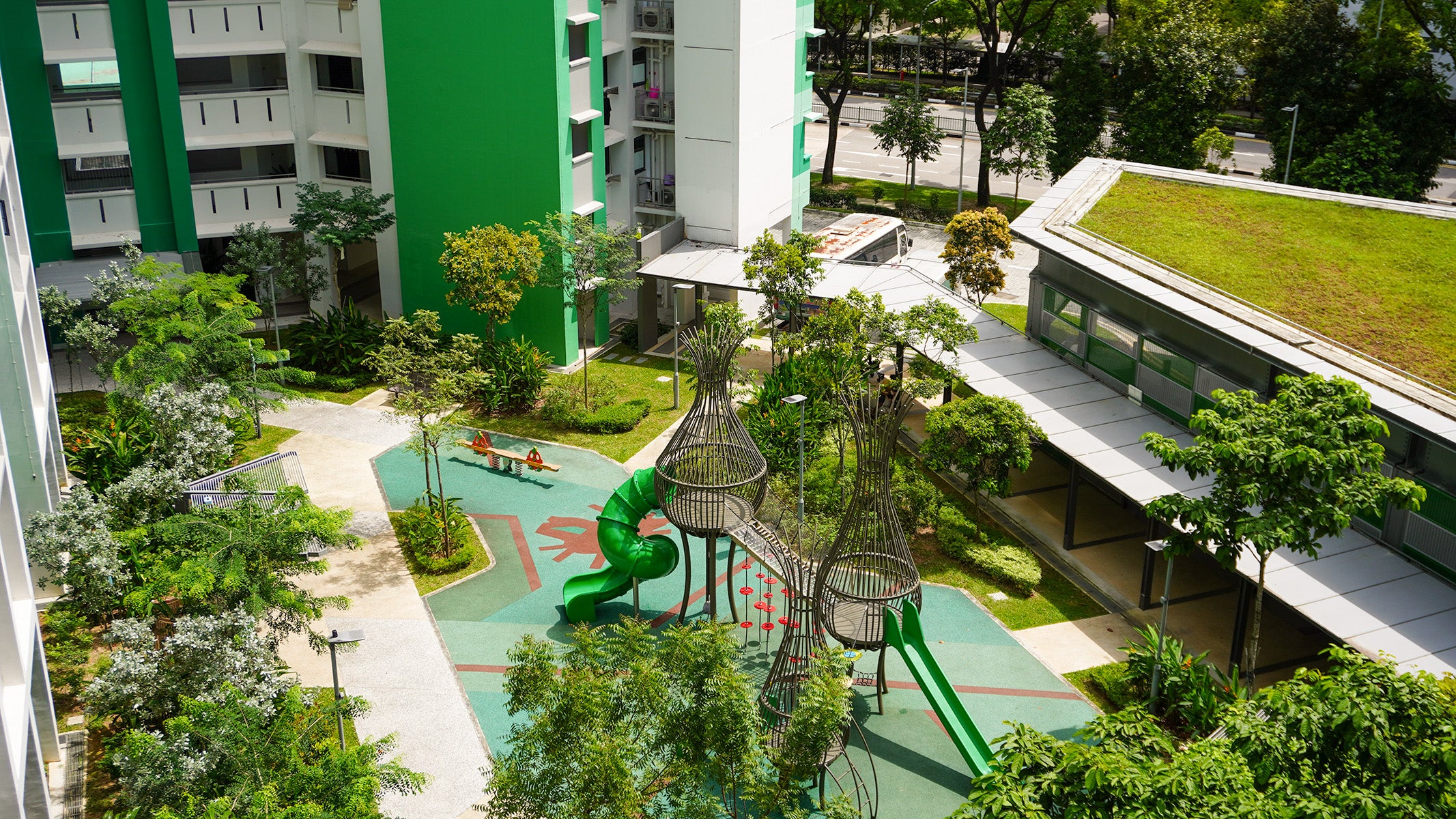 A playground with a bird nest structure design located at Keat Hong Verge with nature inspired playground equipment.