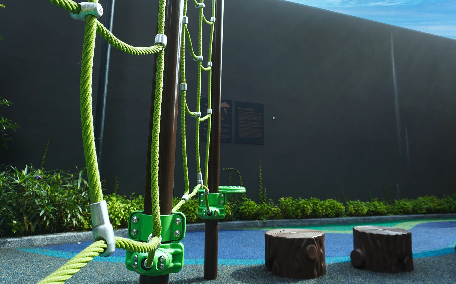 Playworld rope play structure with tree stump stepping pods encourages balance, climbing and coordination skills.